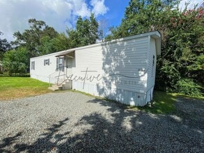 Building Photo - Affordable 3-Bedroom Mobile Home in Sulphur – Central AC & Private Lot