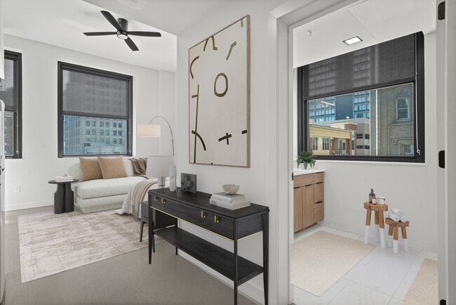 The bathroom and the living space of The Broadway at Midland Lofts - Midland Lofts