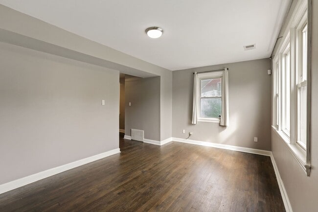 Building Photo - Move-In Ready Cape Cod with 3 Finished Levels & Huge Backyard
