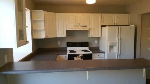 Building Photo - Charming 2 BR/2BA Townhome in Prime Rockrimmon Location!