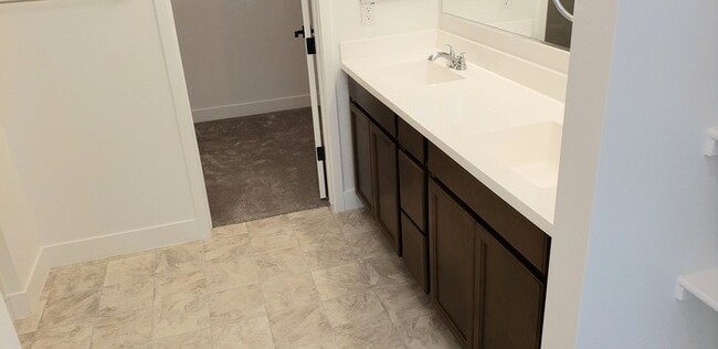Building Photo - The 2 YEARS NEW 4 bedroom + 3 car garage r...