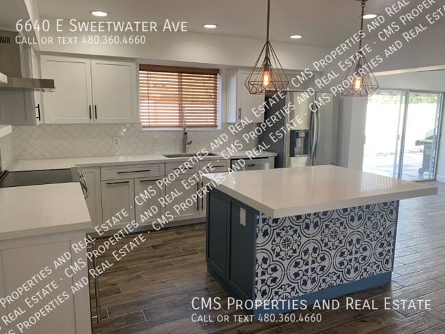 Building Photo - 6640 E Sweetwater Ave