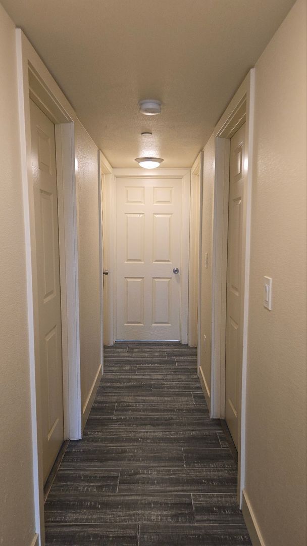 Building Photo - All Bed& Bath at 1st ,2 car Assigned Parking Space at back with access alley,tile &laminate floor...