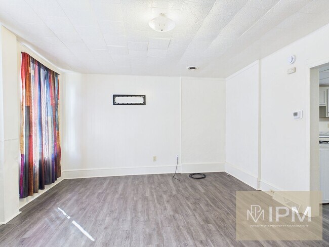 Building Photo - Move-In Special -- 1/2 Off First Months Rent!