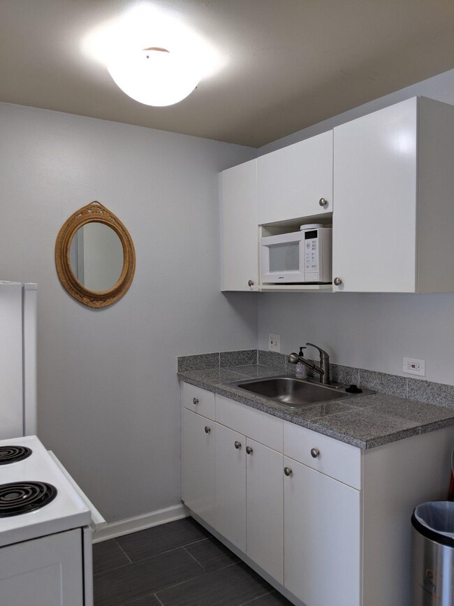 Building Photo - Stylish Studio Living in the Capitol Hill ...