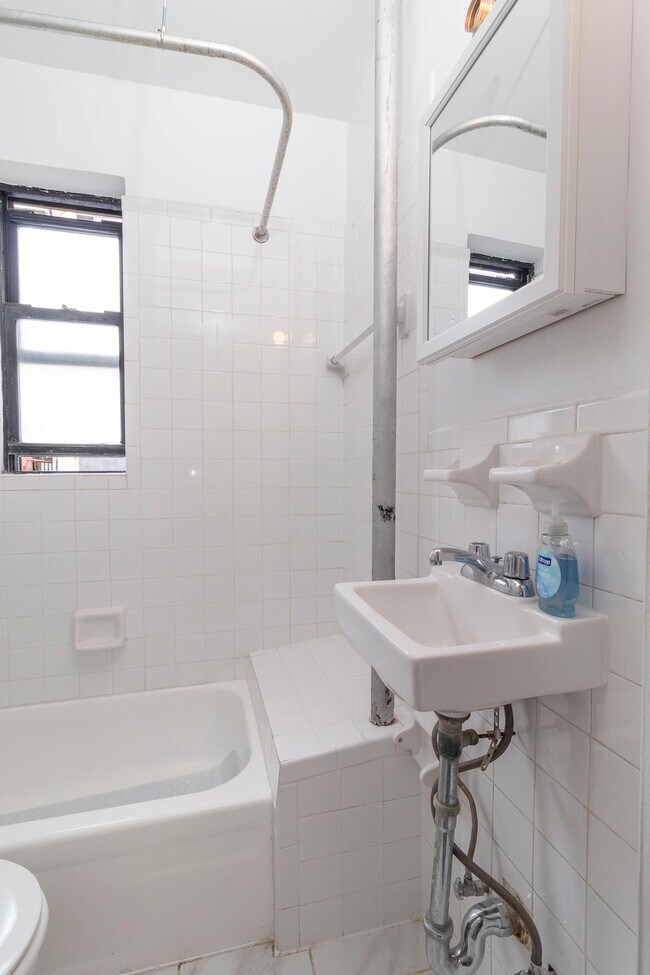 Building Photo - 306-318-318 E 96th St