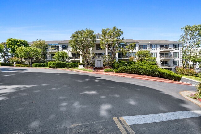 Building Photo - COMING AVAILABLE 4/5/26: Updated Versailles Condo in Newport Beach