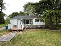 Building Photo - Fully Renovated 3-Bedroom Home with Sunroo...