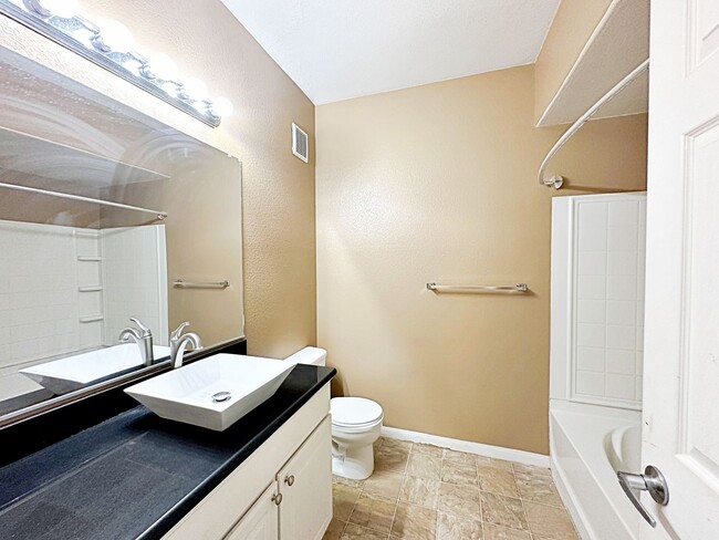 Building Photo - 3 BEDROOM CONDO IN  GUARD GATED COMMUNITY