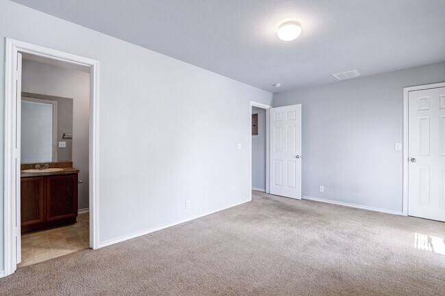 Building Photo - Townhome with Dual Primary Suites: Contemporary Living Near Texas A&M San Antonio