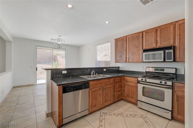 Building Photo - 11215 Dahlia Grove St