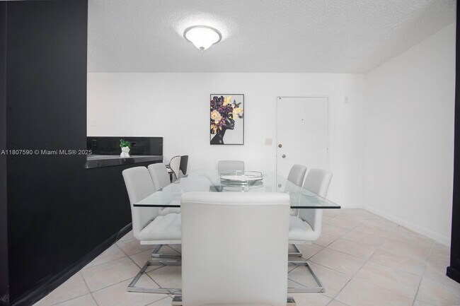 Building Photo - 5555 Collins Ave