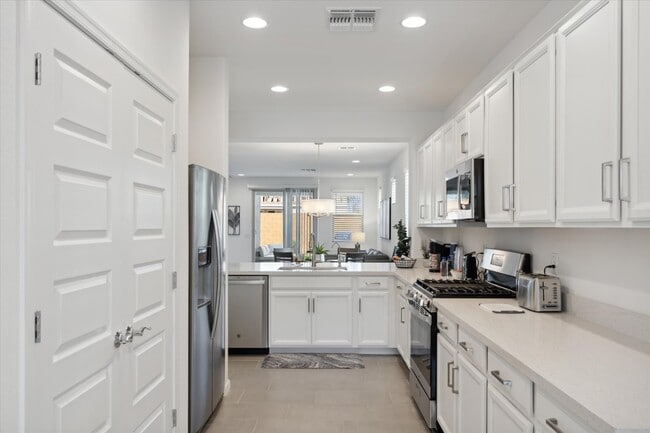 Kitchen with pantry on the left - 9014 W Oregon Ave