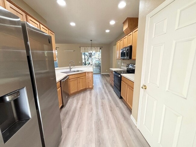 Building Photo - Stunning Remodeled Home with Office, A/C, Fenced Yard & Flexible Living Space!