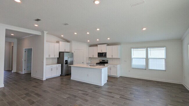 Building Photo - PREMIUM FINISHES AND POND VIEW!!  A PREMIU...