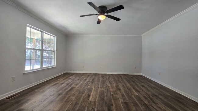 Building Photo - 5607 Whispering Pines Dr