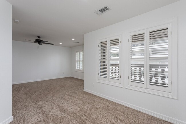 Building Photo - Gorgeous Mediterranean-style condo located...