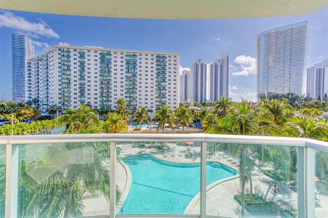 Building Photo - 19380 Collins Ave