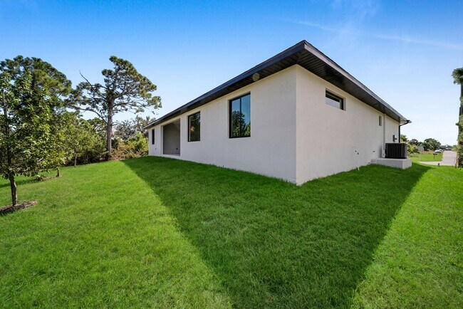 Building Photo - Single family for rent in Port Charlotte. New construction. 3+Den/ 2 bath. City water.