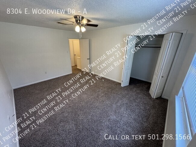 Building Photo - 8304 Woodview Dr N