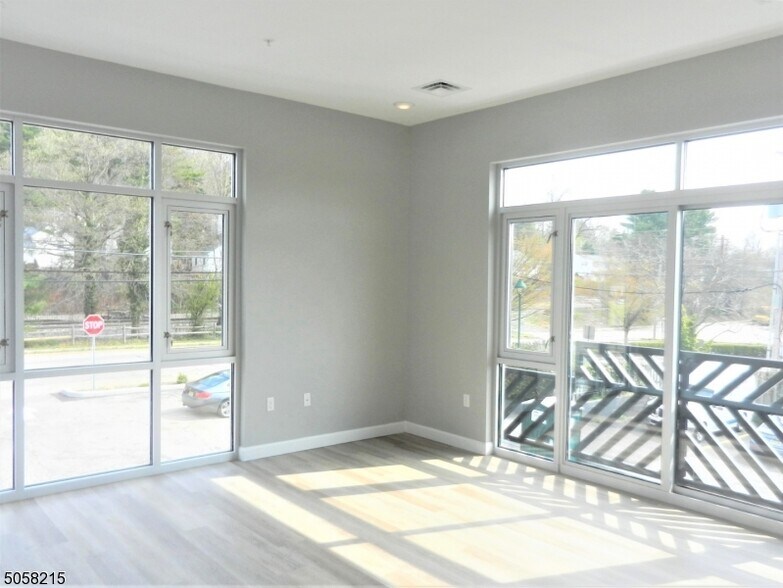 Living Room Features 9' ceilings, floor to ceiling windows & recessing lighting - 271 Millburn Ave