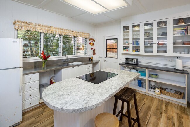 Building Photo - Casual Beach Front 3 Bedroom, 2 Bath Home ...