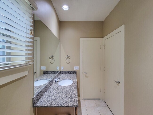 Building Photo - Elegant Gated Townhome Offering Unparallel...