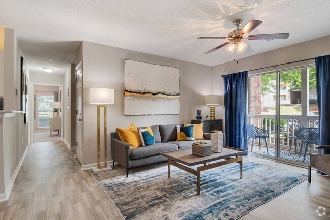 Living Room with Hardwood Flooring - North Park at Eagle's Landing Apartments