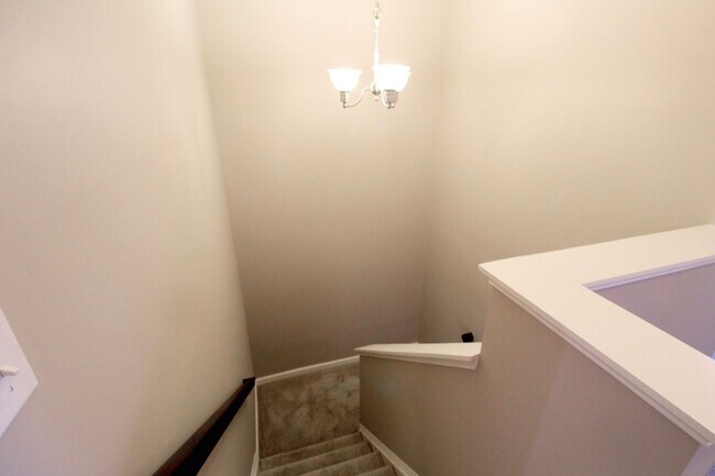 Building Photo - Upscale townhome  with attached garage for rent in the Townes at Bluestone!