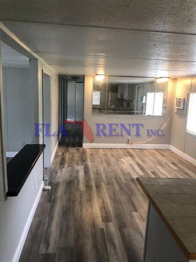 Building Photo - Coming Soon....3/2 Manufactured home with fenced in yard/ Bithlo area