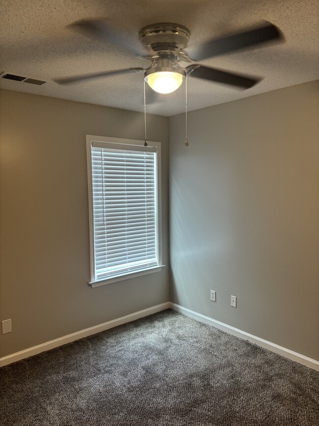 Building Photo - 9150 Cinderhill Cove E