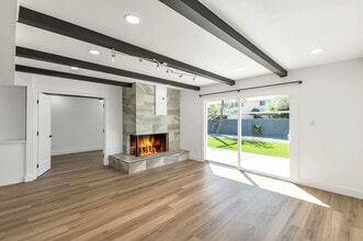 Building Photo - Remodeled 3 Bed 2 Bath 2 Car Garage Unfurnished 12 month lease with bonus room and AC in 2 car ga...