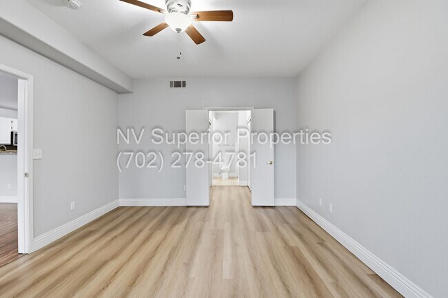 Building Photo - SW!!! 2 Bedroom Condo 1st Floor!! 2 Garage!! Gated!! Community Pool!! Fitness Room!! 2 Primary Be...