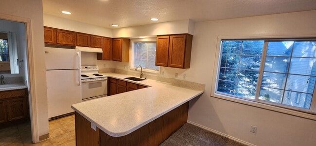 Kitchen with new countertops and sink - 12331 SE Whitcomb Dr.