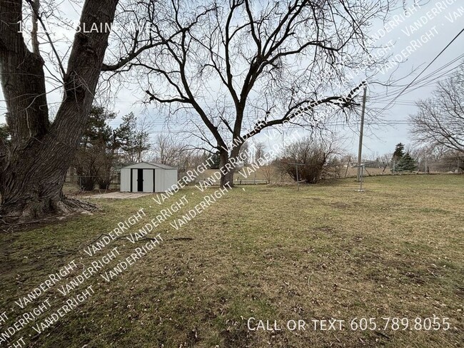 Building Photo - 1015 S Blaine Ave