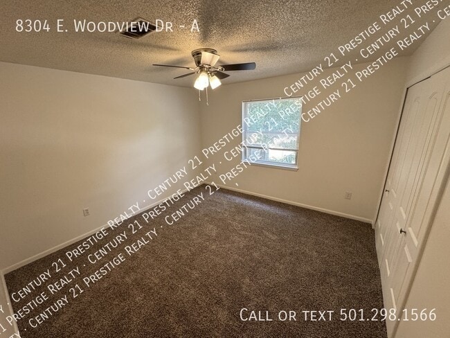 Building Photo - 8304 Woodview Dr N