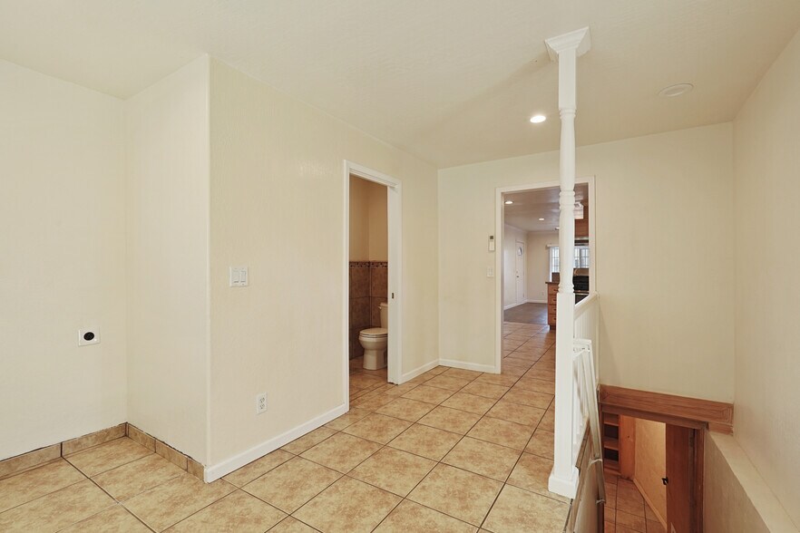 Stairs leads to the basement - 324 Flora St
