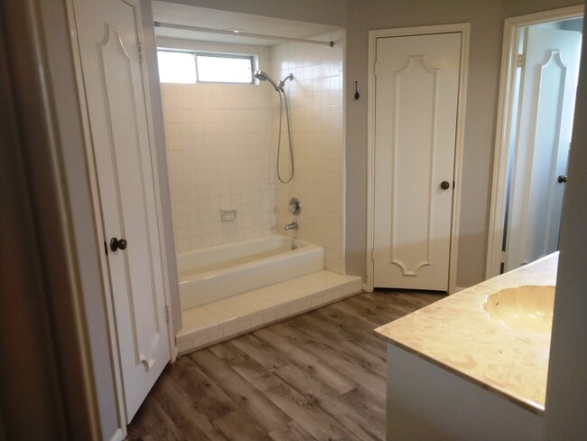 Master bath with large tub/shower, duo closets and separate toilet room - 2518 Water Rest Dr