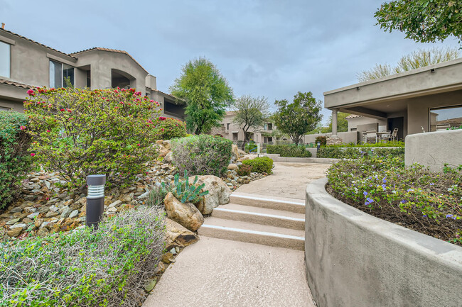 Lush desert landscaping throughout development - 19475 N Grayhawk Dr