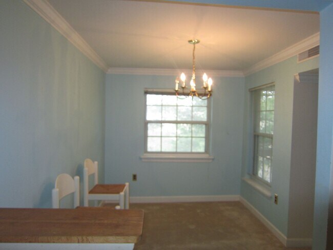 Building Photo - Conveniently located near Tysons, Metrobus, the Toll Road, and West Falls Metro.