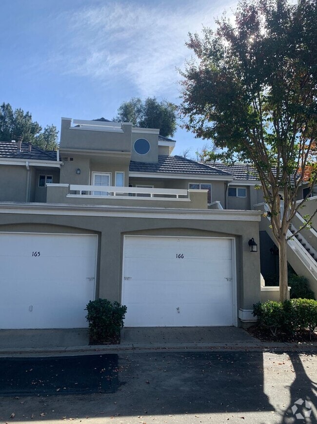 Building Photo - Spacious 1-Bedroom Condo with Loft & Offic...