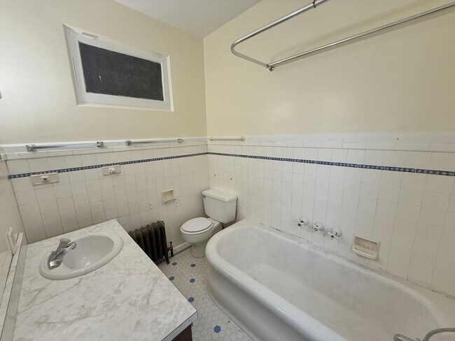 Building Photo - Massive 4 Bedroom, 2 Bath Brick Home