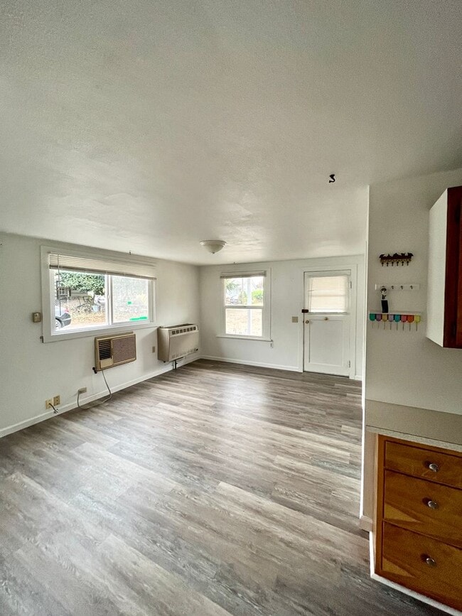 Building Photo - Cozy Single family home with two car garage and controlled access gate