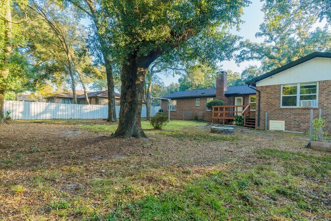 Building Photo - Charming Corner Haven 4BR/3BA Brick Home for Rent