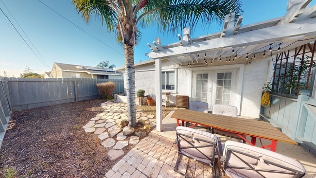 Primary Photo - Charming 2-Bedroom Home with Mini Golf Course, Spacious Yard, and Ample Parking