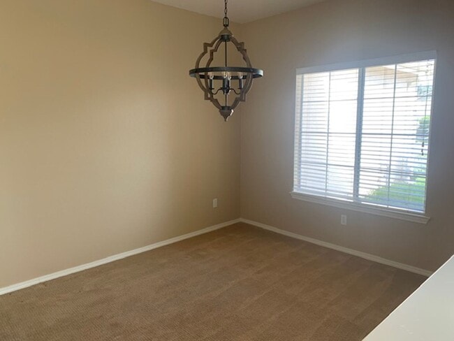 Building Photo - 3 Bedroom, 2 Bath Home with attached 3 car...