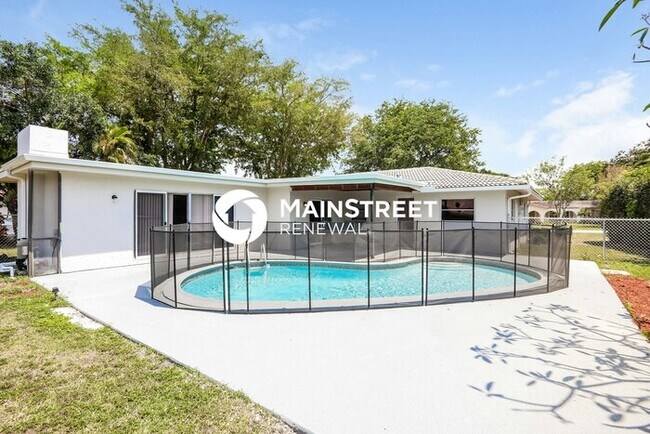 Building Photo - 4 Bedroom Pet-Friendly Home in Coral Springs, FL with Main Street Renewal