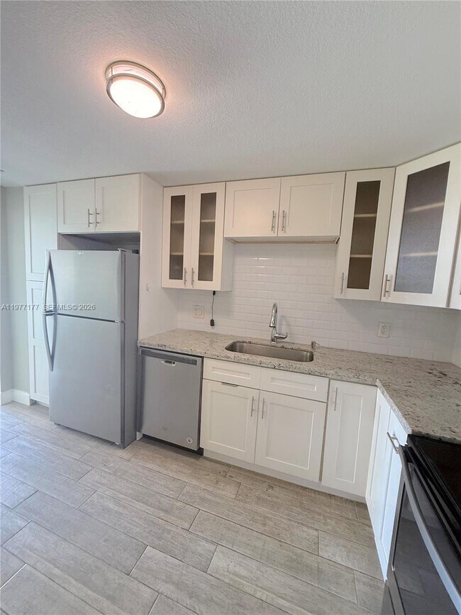 Building Photo - 5750 Collins Ave