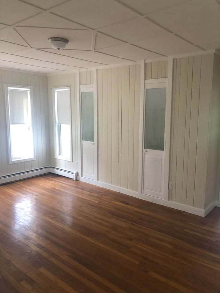 Living room with storage - 89 Congress St