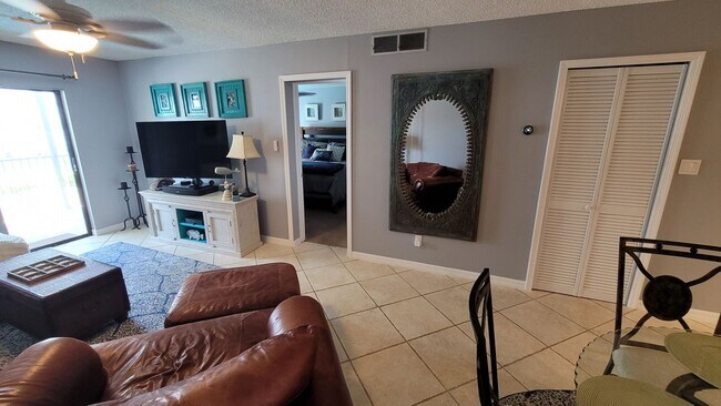 Building Photo - Fully Furnished Condo in the heart of Cocoa Beach-Available 10.1.24 to 4.30.25